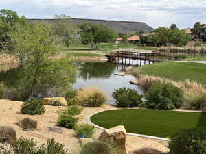 Surrounding community with a water and mountain view