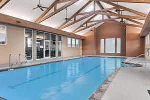 Indoor pool with a ceiling fan