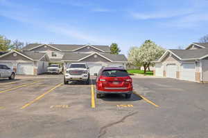 Uncovered parking lot with a residential view