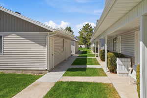 View of home's exterior featuring a lawn