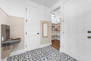 Entryway featuring light tile patterned flooring