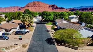 Aerial view of residential area with a mountainous background