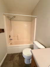 Bathroom featuring vanity and shower / bath combination