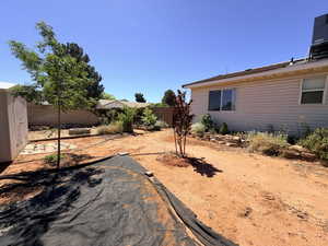View of fenced backyard