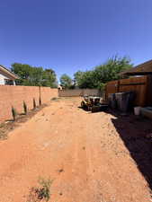 View of fenced backyard