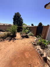 View of fenced backyard