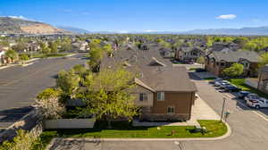 Aerial perspective of suburban area with a mountain backdrop