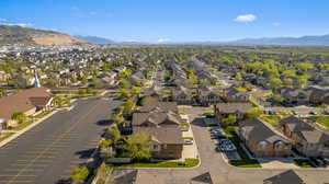 Aerial view of residential area with a mountainous background