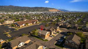 Aerial perspective of suburban area featuring mountains