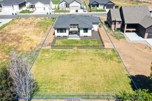 Aerial perspective of suburban area with property parcel outlined