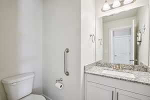 Bathroom with vanity and toilet