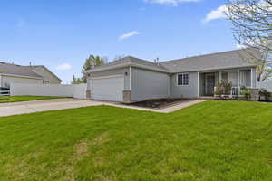 View of front of property with concrete driveway, an attached garage, roof with shingles, brick siding, and a porch