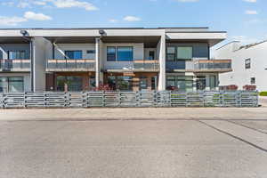 View of front of home featuring stucco siding