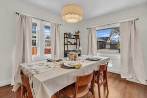 Dining space featuring wood finished floors