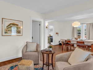 Sitting room featuring wood finished floors