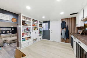 Interior space featuring light wood-style floors and recessed lighting