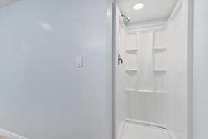 Bathroom with a stall shower