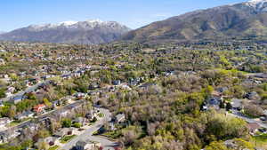 Aerial perspective of suburban area featuring mountains