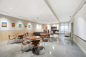 Dining room featuring recessed lighting and wainscoting