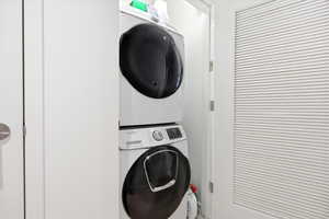 Laundry area with stacked washer / dryer