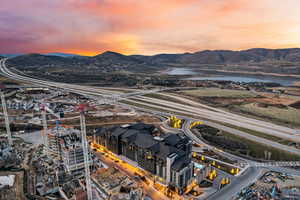 Aerial view at dusk of a water and mountain view