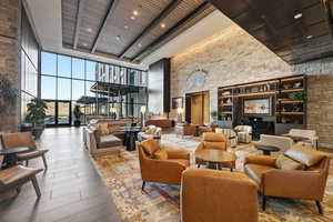 Community lobby featuring a high ceiling and floor to ceiling windows