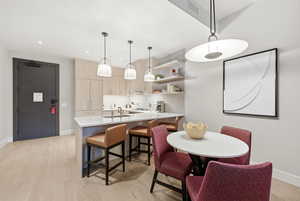 Dining space featuring light wood-style flooring