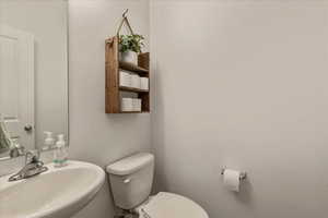 Bathroom with toilet and a sink