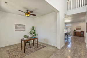 Office area featuring ceiling fan, recessed lighting, and light colored carpet