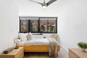 Carpeted bedroom with baseboards