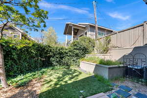 View of fenced backyard