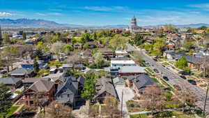 Aerial view of residential area featuring a mountain backdrop