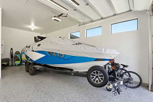 Garage featuring a garage door opener