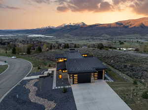 View from above of property with a mountainous background
