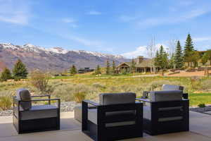 View of patio featuring a mountain view and an outdoor lounge area