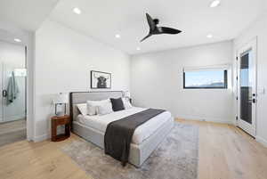 Bedroom with light wood finished floors, recessed lighting, a ceiling fan, and access to exterior