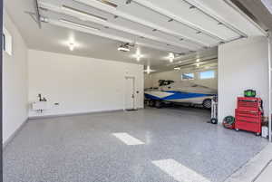 Garage featuring a sink