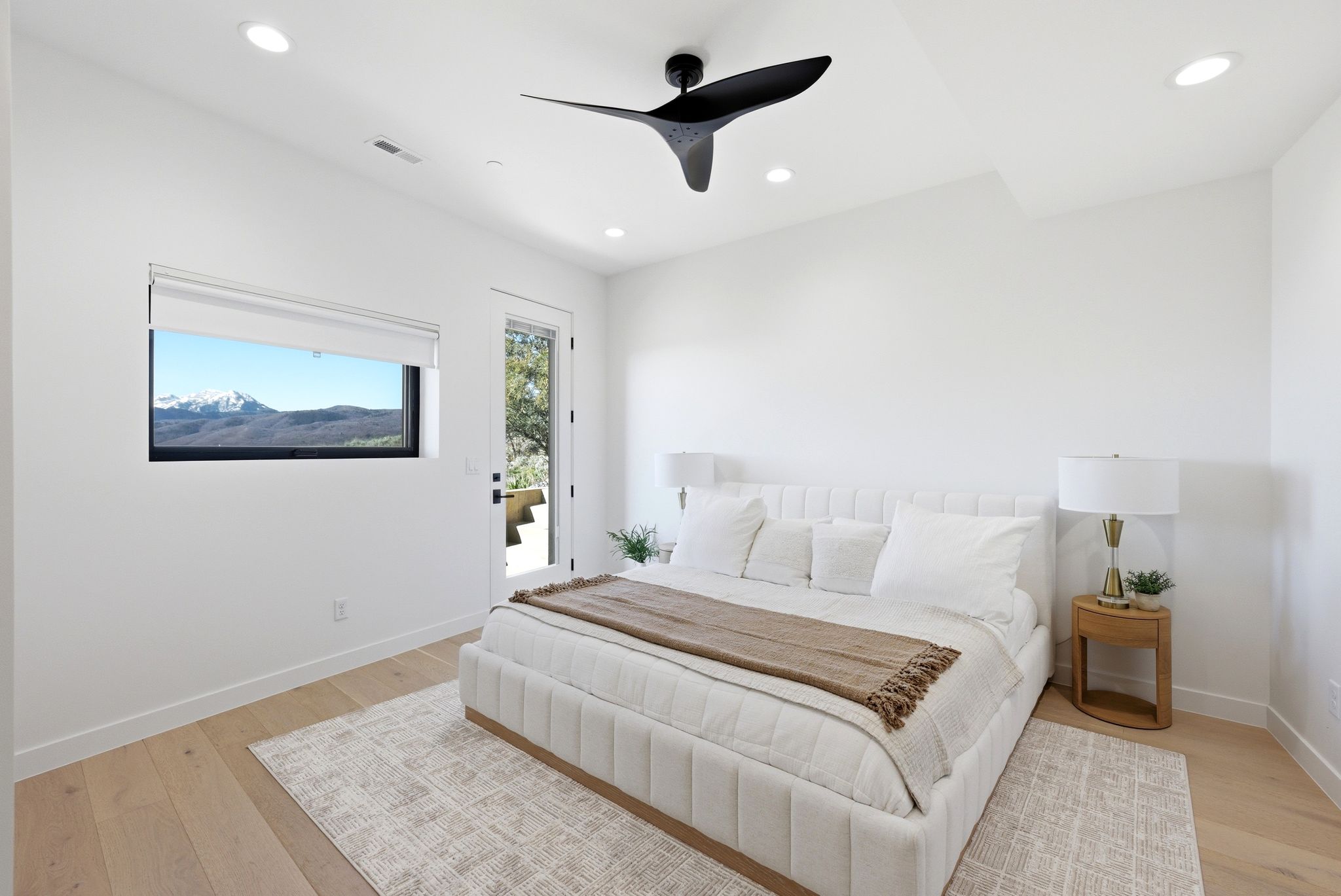 Bedroom with access to exterior, light wood-style flooring, a ceiling fan, and recessed lighting