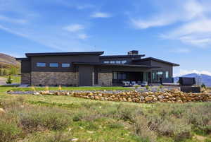 View of property with a mountain view