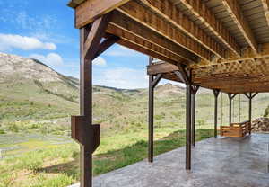 View of patio / terrace with a mountain view