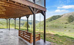 View of patio / terrace with a mountain view