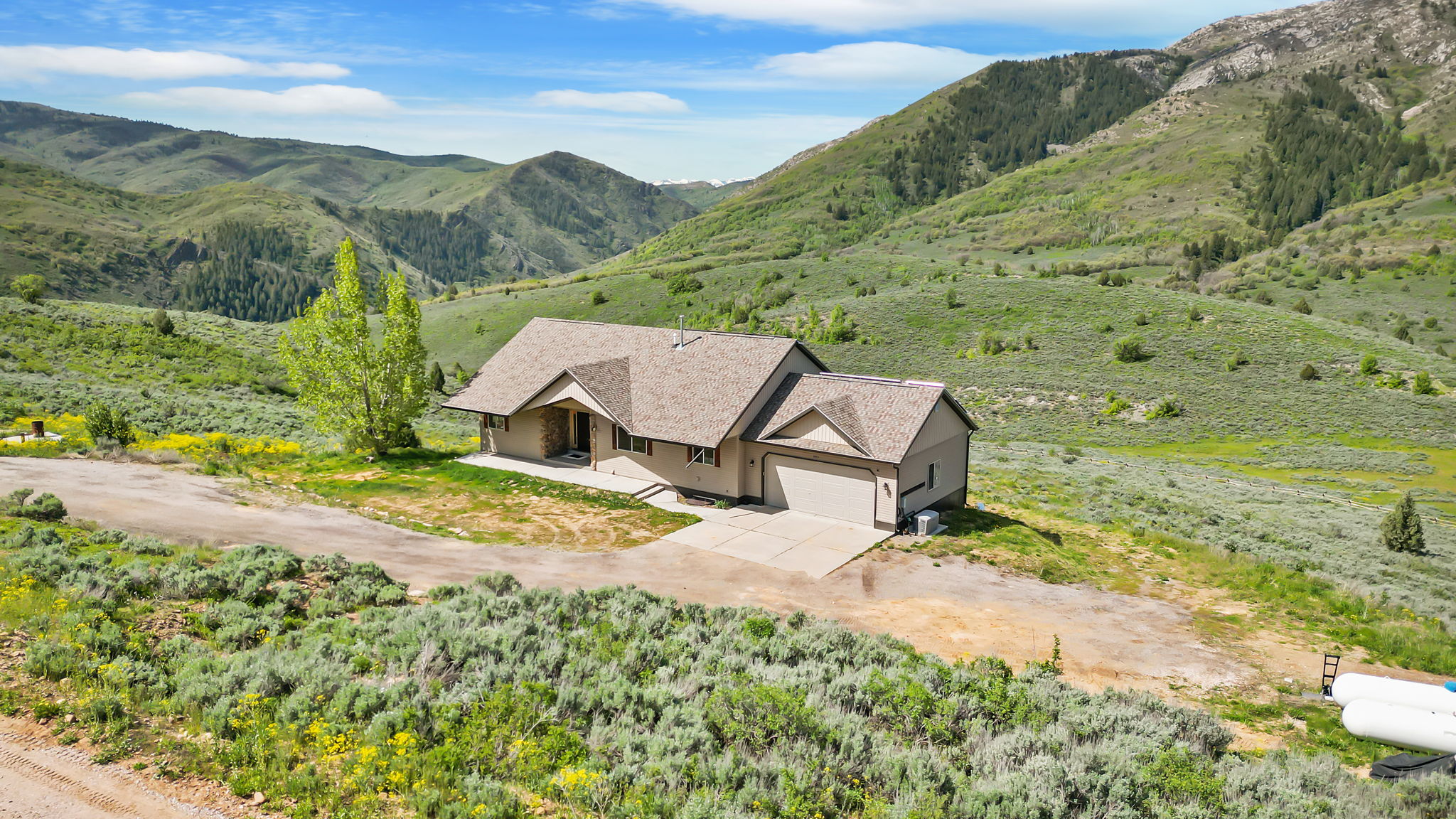 View from above of property with a mountainous background