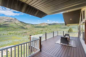 Wooden terrace with a mountain view