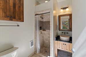 One of two bathrooms located poolside