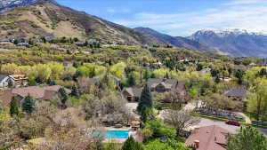 Aerial view of residential area with a mountain backdrop