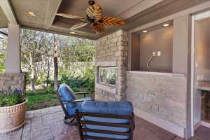 View of patio featuring a ceiling fan