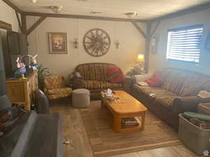 Living area with wood finished floors