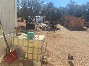View of yard with an outdoor structure
