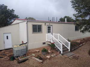 Manufactured / mobile home with crawl space and a metal roof