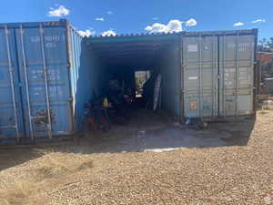 View of outdoor structure featuring a carport